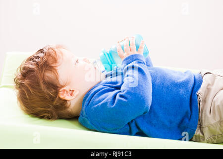 Baby boy drinking water Stock Photo
