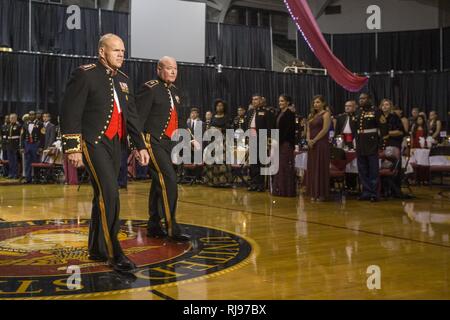 Commandant of the Marine Corps Gen. Robert B. Neller, left, and Maj. Gen. Walter L. Miller, Jr., commanding general of II Marine Expeditionary Force (II MEF), march during the II MEF Marine Corps Birthday Ball at Marine Corps Base Camp Lejeune, N.C., Nov. 5, 2016. Neller attended the birthday ball as the guest of honor.