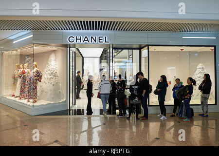 HONG KONG - DECEMBER 25, 2015:  Chanel store in Hong Kong. Chanel S.A. is a French, privately held company owned by Alain and Gerard Wertheimer, grand Stock Photo