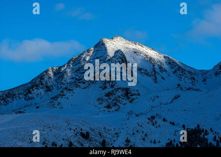 Österreich, Tirol, Stubaier Alpen, Kühtai, Die letzten Sonnenstrahlen auf dem Gipfel des Gaiskogel Stock Photo