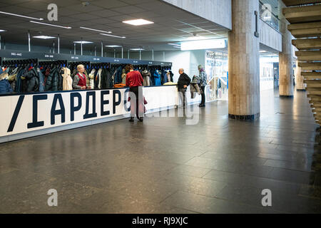 MOSCOW, RUSSIA - JANUARY 18, 2019: people in cloakroom of New Tretyakov Gallery of Modern Art on Krymsky Val in Moscow. This museum is a branch of The Stock Photo