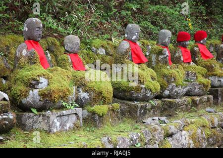 Nikko, Japan - jizo statues at famous Kanmangafuchi. Jizo, also known as Ksitigarbha are bodhisattvas in East Asian Buddhism. Stock Photo