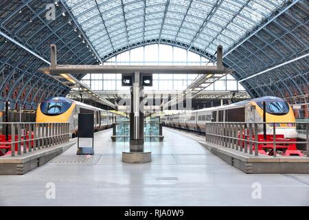 LONDON, UK - MAY 15, 2012: St. Pancras train station in London. The station was opened in 1868. In 2013 more than 24 million people used this station. Stock Photo