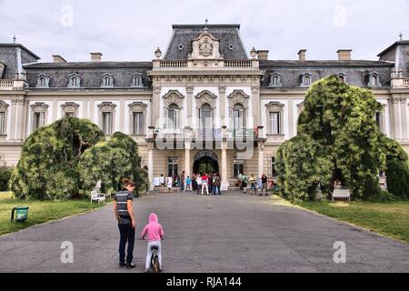 KESZTHELY, HUNGARY - AUGUST 11: Tourists visit Festetics Palace on August 11, 2012 in Keszthely, Hungary. In 2011 tourism receipts in Hungary brought  Stock Photo