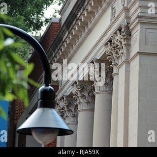 On the pedestrian mall in downtown Charlottesville, Virginia with the historic Peoples National Bank in the background. Stock Photo