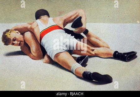 Photograph of Jean Földeák & Dane Jensen wrestling at the 1932 Olympic games. This match was won by Jean Földeák. He later won silver in the  middleweight event. Stock Photo