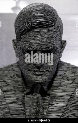 Alan Turing (1912 – 1954), English computer scientist, mathematician, logician, cryptanalyst, philosopher, theoretical biologist. Sculpture in slate by Stephen Kettle (born 12 July 1966). This life size statue of Alan Turing is at the Bletchley Park Museum Stock Photo