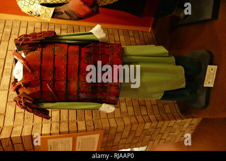 Modern replica of armour worn by the Terracotta warriors. The Terracotta Army is a collection of terracotta sculptures depicting the armies of Qin Shi Huang, the first Emperor of China. It is a form of funerary art buried with the emperor in 210–209 BCE and whose purpose was to protect the emperor in his afterlife. Stock Photo