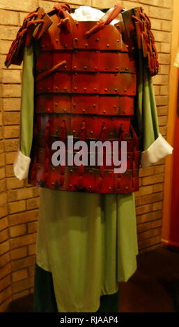 Modern replica of armour worn by the Terracotta warriors. The Terracotta Army is a collection of terracotta sculptures depicting the armies of Qin Shi Huang, the first Emperor of China. It is a form of funerary art buried with the emperor in 210–209 BCE and whose purpose was to protect the emperor in his afterlife. Stock Photo