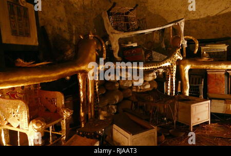 reconstruction depicting the tomb of Tutankhamen in 1922. Howard Carter (9 May 1874 – 2 March 1939) was a British archaeologist and Egyptologist who became world-famous after discovering the intact tomb (designated KV62) of the 18th Dynasty Pharaoh, Tutankhamen in November 1922. Stock Photo