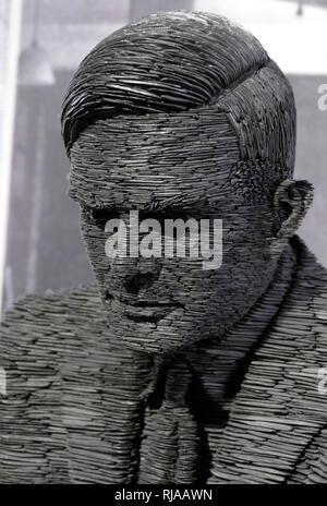 Alan Turing (1912 – 1954), English computer scientist, mathematician, logician, cryptanalyst, philosopher, theoretical biologist. Sculpture in slate by Stephen Kettle (born 12 July 1966). This life size statue of Alan Turing is at the Bletchley Park Museum Stock Photo