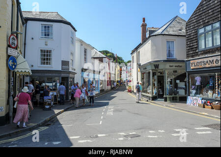 Tourists shopping on a sunny summers day on Lanadwell Street in Padstow, Cornwall, England, Stock Photo