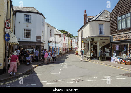 Tourists shopping on a sunny summers day on Lanadwell Street in Padstow, Cornwall, England, Stock Photo