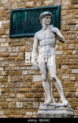 A copy statue of Michelangelo's David at the entrance of the Palazzo Vecchio Stock Photo