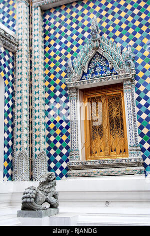 Sculpture and facade ornament detail of Gandhara Buddha Viharn chapel building in Wat Phra Kaew temple within Grand Palace complex in Bangkok, Thailan Stock Photo