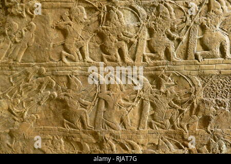 Stone carved relief depicting an attack on Lachish. Assyrian, about 700-692 ВС. From Nineveh, South-West Palace, This panel, show an important incident during Sennacherib's campaign of 701 BC, the capture of Lachish in the kingdom of Judah. Stock Photo