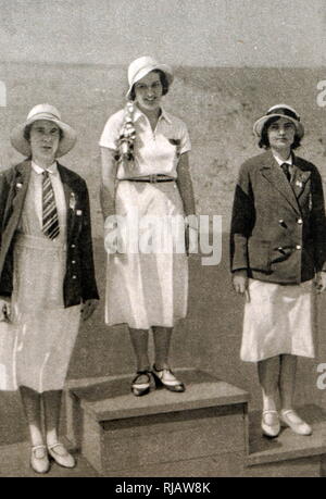 Photograph of the podium for the women's foil at the 1932 Olympic games. Ellen Müller-Preis (1912 - 2007) took gold for Austria, Heather Seymour 'Judy' Guinness (1910 - 1952) silver for Great Britain & bronze Erna Bogen-Bogáti (1906 - 2002) of Hungary. Stock Photo