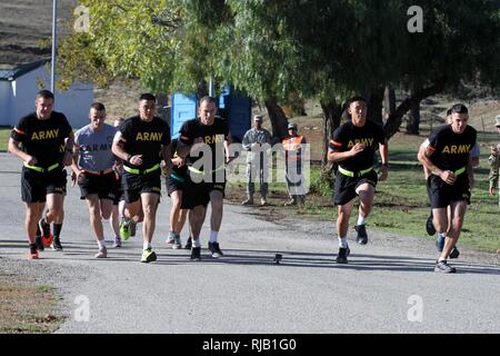 Competitors in the California Army National Guard’s 2017 Best Warrior Competition begin the run portion of the Army Physical Fitness Test (APFT) during California’s 2017 Best Warrior Competition Nov. 1-5, 2016, at Camp San Luis Obispo, San Luis Obispo, California. (Army National Guard Stock Photo