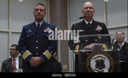 PROVIDENCE, R.I. (Nov. 5, 2016) Coast Guard Capt. Richard J. Shultz, commander, Sector Southeastern New England, and Rear Adm. Jeffrey A. Harley, president, U.S. Naval War College, participate in a ceremony honoring U.S. military veterans at the Rhode Island Department of Education building. “It is an honor to be here today. We salute the veterans who did their jobs without recognition, the veterans who honored their country but didn’t make the history books, veterans who will never have a street, building, ship named after them,” said Harley. The ceremony was followed by a torch procession by Stock Photo