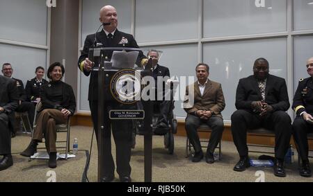 PROVIDENCE, R.I. (Nov. 5, 2016) Rear Adm. Jeffrey A. Harley, president, U.S. Naval War College, provides remarks during a ceremony honoring U.S. military veterans at the Rhode Island Department of Education building. “It is an honor to be here today. We salute the veterans who did their jobs without recognition, the veterans who honored their country but didn’t make the history books, veterans who will never have a street, building, ship named after them,” said Harley. The ceremony was followed by a torch procession by veterans who walked from the Department of Education building to Waterplace Stock Photo