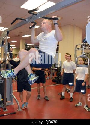 NASHVILLE, Tenn. (Nov. 4, 2016) Naval Reserve Officers Training Corps (NROTC) Midshipman 2nd Class Connor McKeehan, a junior at the University of Wisconsin-Madison, performs pull ups in the Vanderbilt University Recreation Center. Vanderbilt NROTC hosted an Explosive Ordnance Disposal (EOD) “Exceptional Exposure” weekend for more than 40 NROTC midshipmen from units around the country. (U. S. Navy Stock Photo