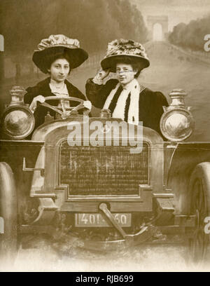 Two women in a car in a studio portrait, Paris Stock Photo