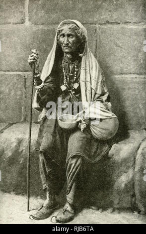 Beggar woman in Bukhara, Uzbekistan, Central Asia Stock Photo