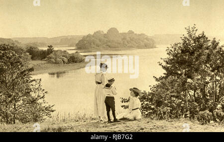 People by a lake, Zealand, Denmark Stock Photo