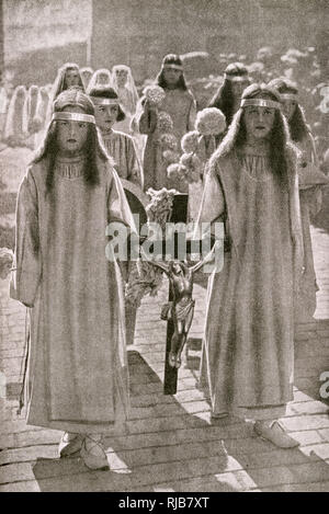 Girls taking part in a religious procession, France Stock Photo