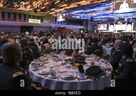 Ohio Army National Guard Lt. Col. Jeffrey Watkins (left) was among a group of Ohio National Guard Soldiers and Airmen who attended the 33rd annual Dr. Martin Luther King Jr. Birthday Breakfast Jan. 15, 2018, at the Greater Columbus Convention Center in downtown Columbus, Ohio. Event organizers say it is the largest of its kind in the U.S. to honor the legacy of the civil rights leader, who was friends with Watkins’ Family in the 1960s. (Ohio National Guard Stock Photo