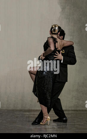 Man and woman tango dancing Stock Photo