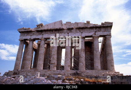 The Parthenon on the Athenian Acropolis, Greece, dedicated to the goddess Athena. Construction began in 447 BC when the Athenian Empire was at the peak of its power. It was completed in 438 BC although decoration of the building continued until 432 BC. It is the most important surviving building of Classical Greece, generally considered the zenith of the Doric order Stock Photo