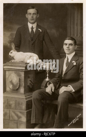 Proud owners of a rabbit Stock Photo - Alamy
