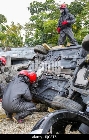 U. S. Army Reserve Soldiers assigned to 424th engineer Company works in a Joint Training Exercise on the Miami-Dade Fire Rescue Urban Search and Rescue Training Site in Miami, Fla. Jan. 10, 2018. This JTE focused on building response capabilities and seamless transition between the local first responders and the follow-on support provided by the National Guard and Active duty soldiers. (U. S. Army Stock Photo