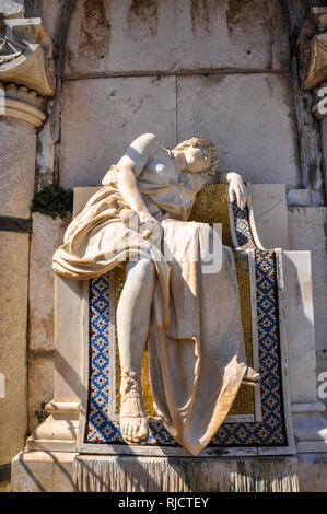 A carved figure forming part of a memorial to sea captain Anton Mimbelli in the cemetery of Our Lady of the Angels (Andela) Monastery Stock Photo