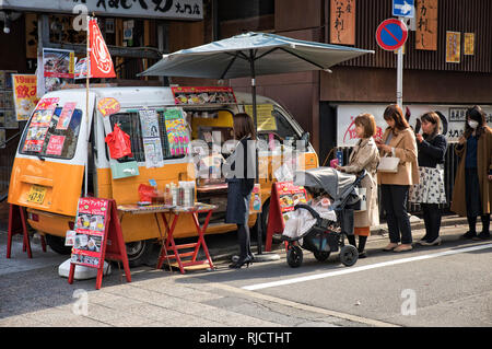 Lunch time Queue for food Stock Photo