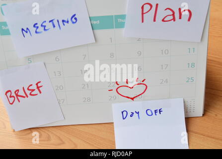 paper note for vacation remind stick on calendar Stock Photo