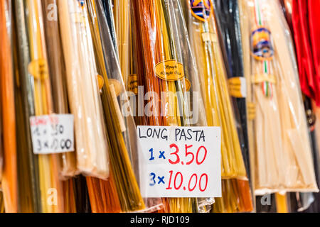 Florence, Italy - August 30, 2018: Firenze mercato centrale central market with stall with dried long pasta sign and price on retail display closeup Stock Photo