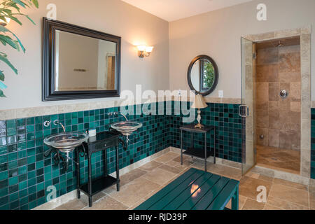 Luxury spa bathroom with limestone tile and shower. Stock Photo