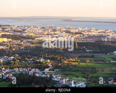 View of Setubal as seen from the Palmela Castle in Setubal District south of Lisbon in Portugal, at sunset. Stock Photo