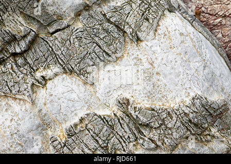 Beautiful gray colored, textured eroded rock at a coastline in the Philippines Stock Photo