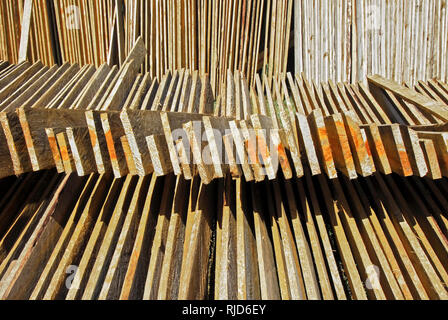 Cut and marked pine wood planks layed-out for drying in the sun, seen near Sagada Town, Mountain Province, Philippines Stock Photo