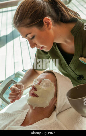 Attractive mature woman having beauty treatments in a salon on board a cruise ship Stock Photo