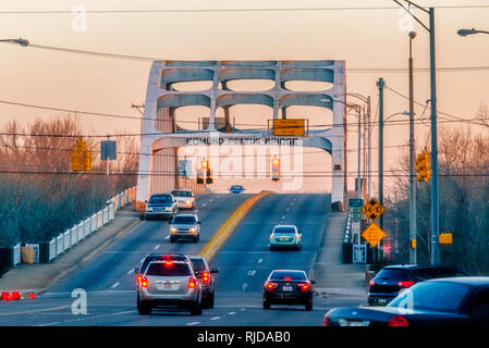 Cars travel across the Edmund Pettus Bridge, Feb. 14, 2015, in Selma, Alabama. The bridge played an important role in the Civil Rights Movement. Stock Photo