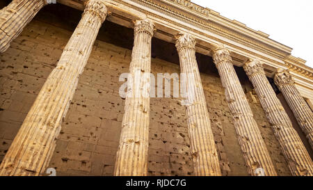 Weathered Columns of the Temple of Hadrian in Rome, Italy Stock Photo