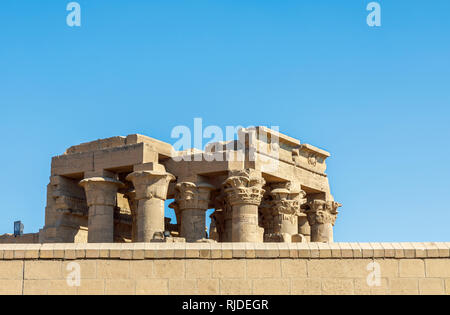 View of columns at the Temple of Kom Ombo, Temple of Sobek, an unusual double temple from the Ptolomeic dynasty in Upper Egypt with clear blue sky