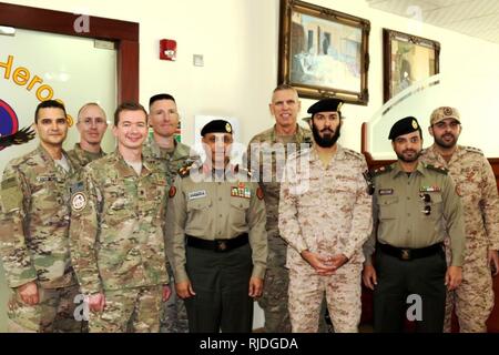 35th Infantry Division hosts a luncheon at the Oasis dining facility with the Kuwait Armed Forces Military Justice Authority Jan. 17. The legal teams met to discuss legal cooperation between the two countries and building a lasting partnership for the future (left to right) Capt. Sam Abourched, Lt. Col. Paul Boyd, Maj. Jeremy Snyder, Col. John Maier, Brig. Gen. Mubarak Al Khurainij, Maj. Gen. Victor Braden, Lt. Col. Jamal Al Kandri, Lt. Col. Qunais Al Adwani, Capt. Mahammad Jalal Jafar. Stock Photo