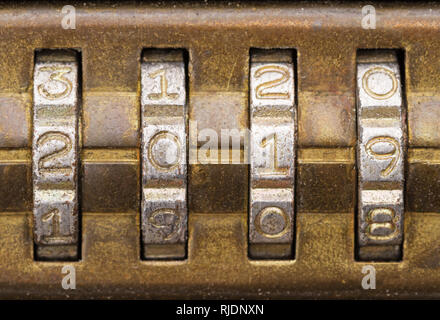 closeup of 2019 on old brass combination lock dials Stock Photo