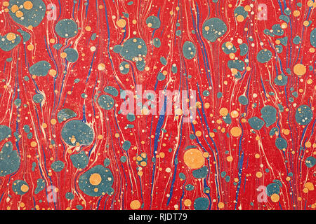 antique red and blue marbled paper from an 1800s book end paper Stock Photo