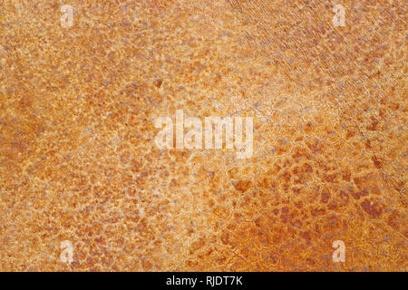finished stained orange concrete with fine crack structure background texture Stock Photo